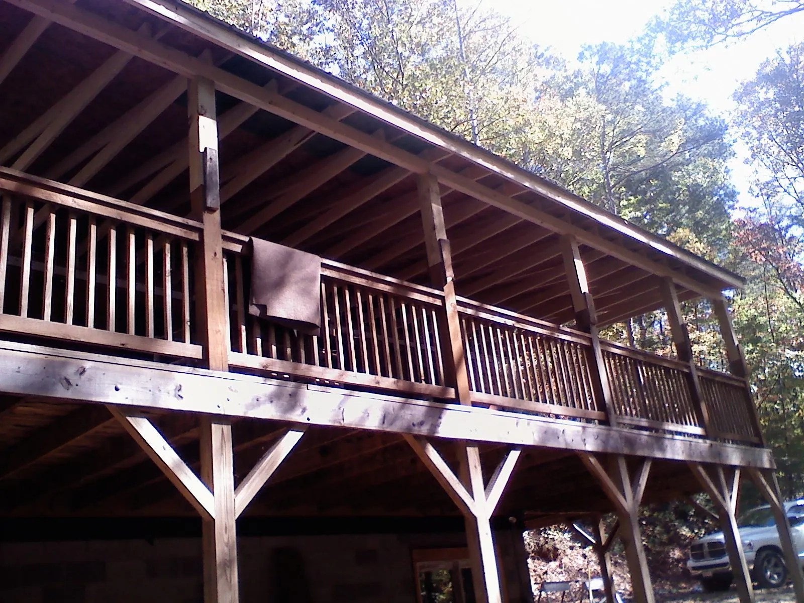Timber framing under a new elevated porch and deck — Roof Leak Repair in Lavon by Roofing Brothers